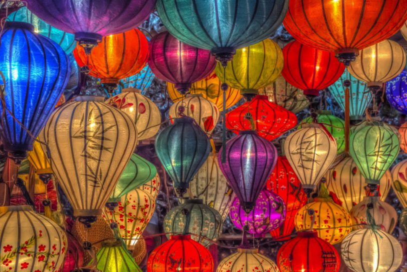 Lantern on display in reds, yellows and purples in Hoi An city, Vietnam