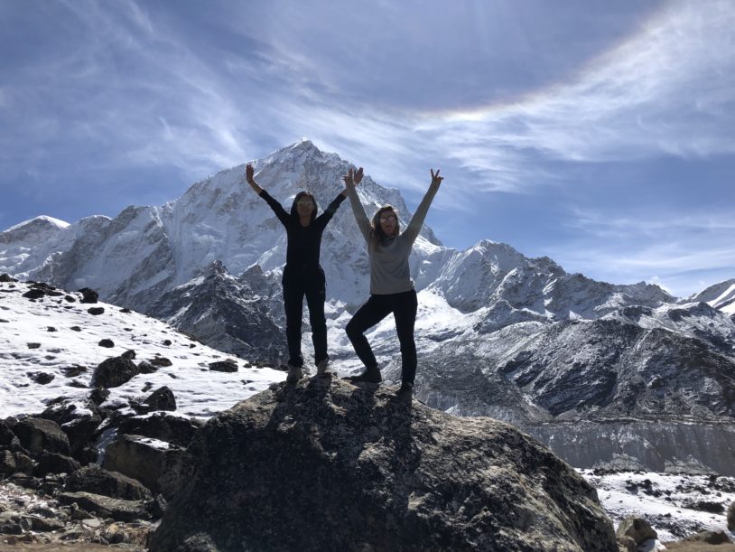 Two hikers summiting ridges at Everest Base Camp