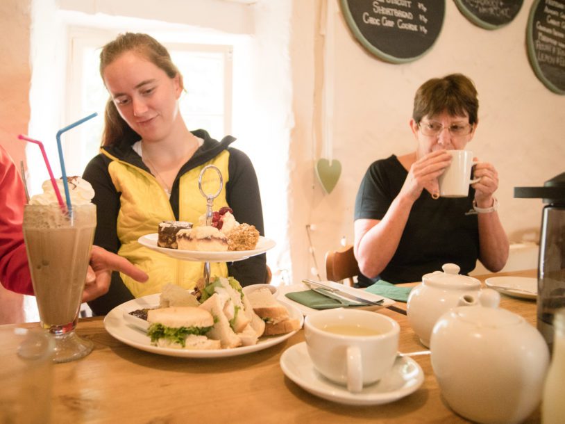 Two women having a meal and tea at Muker Tearoom