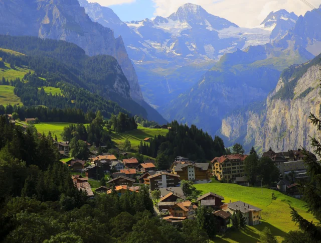 Above Wengen alpine village panorama, and Lauterbrunnen idyllic valley, Swiss Alps