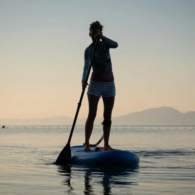 A person on a paddle board.